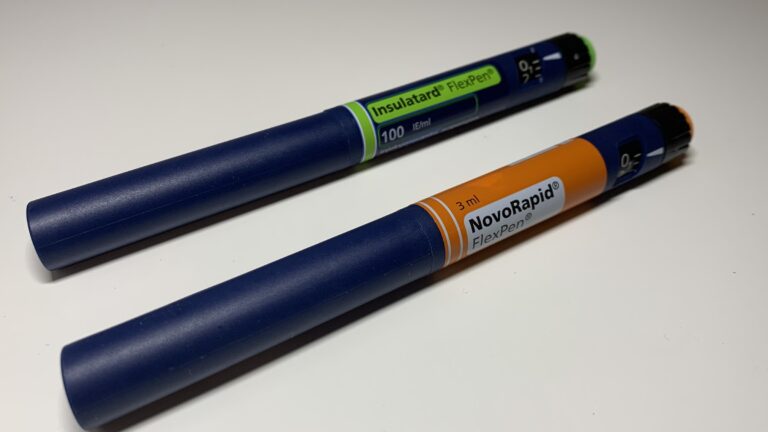 Two insulin pen injectors side by side, the drug-device format used for GLP-1 products